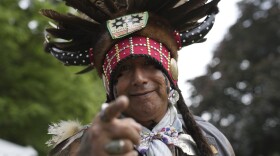 A member of the First Nation reacts at the Traditional Pow Wow during the Indigenous Arts Festival at Fort York National Historic Site in Toronto, Canada, Saturday, June 21, 2025. 