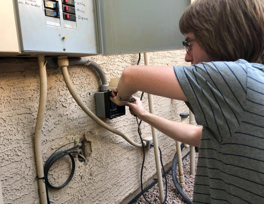 Scott Nelson wires electrical panel