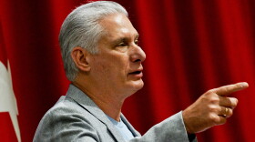 FILE - Cuban President Miguel Diaz-Canel delivers a welcome speech to participants of the, "Nuestra America," or "Our America Convoy," at the Convention Palace in Havana, Cuba, March 20, 2026.