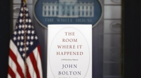 A copy of John Bolton's new book, <em>The Room Where It Happened</em>, stands in the White House briefing room. On Saturday, a federal judge declined the Trump administration's request to block the publication of the former national security adviser's book.