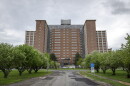  The 17-story Terrance Building looms over the development site off Elmwood Avenue in the city near the Brighton border. The old psychiatric center has been vacant for roughly three decades.