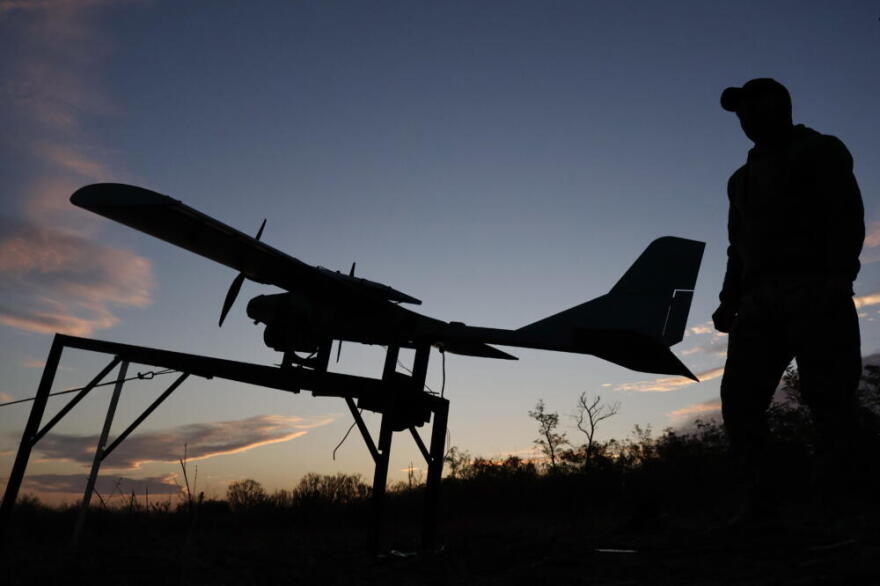 A Ukrainian serviceman launches a drone towards Russian positions at the front line in the Zaporizhzhia region, Ukraine, Oct. 7, 2026. (Andriy Andriyenko/Ukraine's 65th Mechanized Brigade via AP)