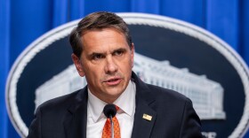 Acting Attorney General Todd Blanche speaks at a news conference at the Justice Department in Washington, April 7, 2026.