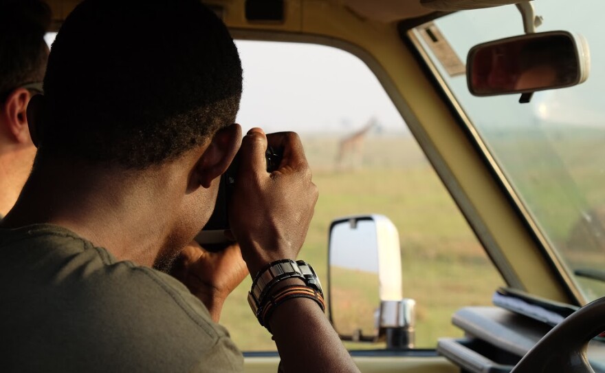 Tutilo Mudumba and Robert Montgomery conducting field work