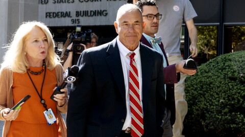 FILE: Reporters follow Kosta Diamantis as he leaves the U.S. District Court in Bridgeport during a break in his trial on October 6, 2025.
