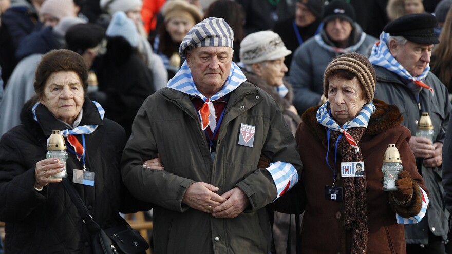 Survivors of Auschwitz at the former concentration camp Sunday.