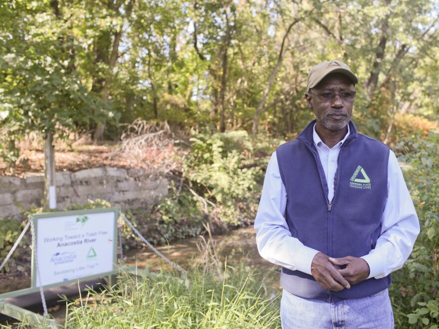 Dennis Chestnut stands next to a stretch of the Anacostia River in Washington, D.C., on Oct. 2. Chestnut, who has been working to clean up the Anacostia for decades, says it can take a long time for a nonprofit to see an end result.