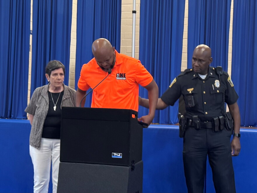 Devine Carama with ONE Lexington joined Lexington Mayor Linda Gorton (L) and Lexington Police Chief Lawrence Weathers (R) for a press conference Sunday afternoon to update the community on Saturday's mass shooting.