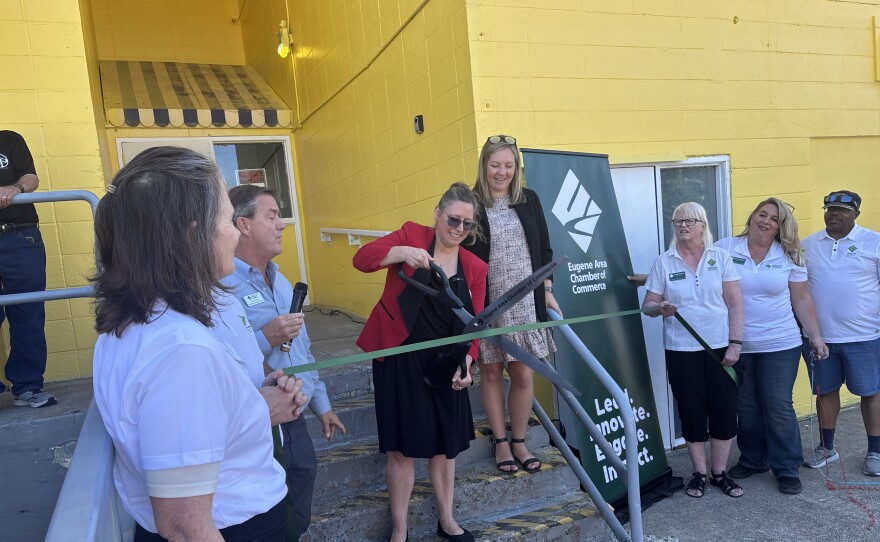 A ceremonial ribbon-cutting.
