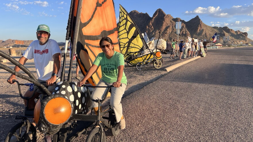 Micah Voiers and Jen Simon attend a no wall rally in Terlingua featuring bikes by the Austin Bike Zoo.