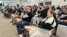 Community members and parents attend an Oldham County School Board meeting on whether to allow Bible-based moral education group Lifewise to operate within the district.