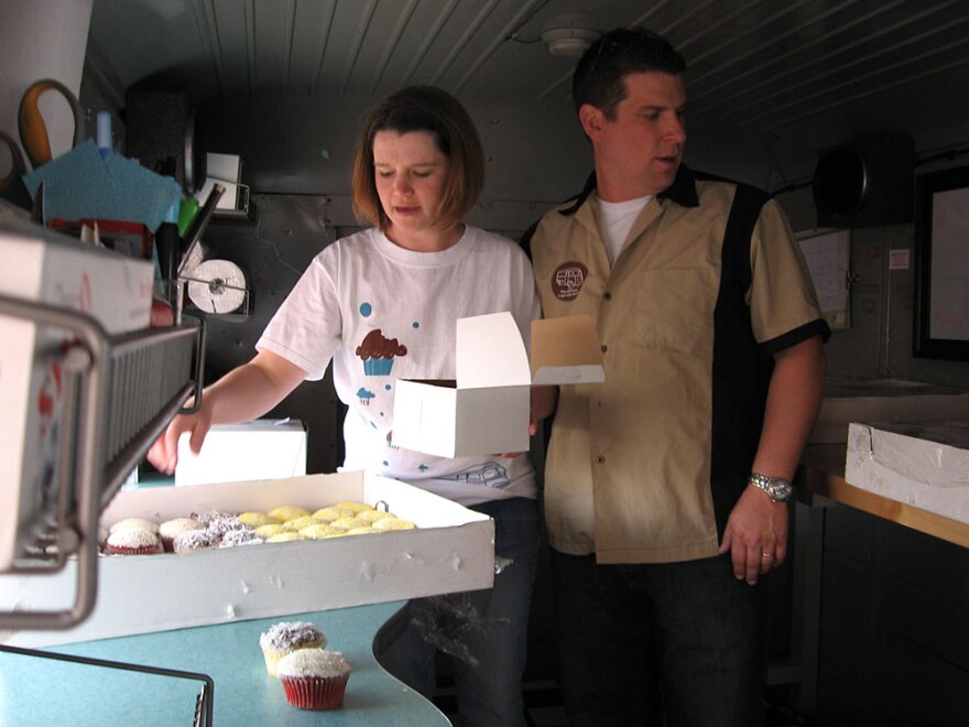 Denon (left) and Sean (right) Moore have turned to social media to help sell their cupcakes out of a truck. Their goal is to bring in $1,000 a day in the truck to supplement the bakery.