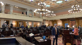 Members of the Ohio House come into the chamber a few minutes before session starts on June 4, 2020.