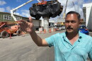 Tyler Dos Santos-Tam points out streets in the Iwilei neighborhood on Monday, Oct. 5, 2026 where the Skyline rail line is being built in Honolulu.