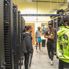 A mini data center at Louisiana Delta Community College where students practice laying fiber and setting up servers.