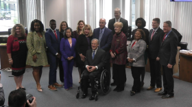 Members of the Texas State Board of Education pose for a photo with Gov. Greg Abbott on February 3, 2023 after being sworn in for a new term.