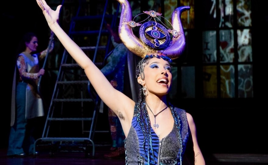  An actor in a horned headdress performing in Rent, at the Oregon Shakespeare Festival in Ashland, OR.  