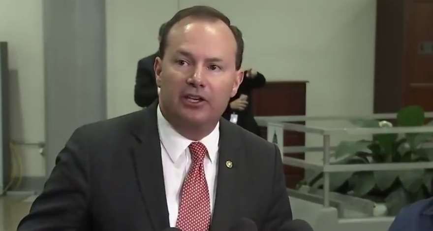 Screenshot from a video of Mike Lee speaking to reporters.