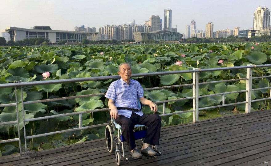 Zhang Lifa, the father of Zhang Hai, in a Wuhan park last year. He spent several years participating in China's nuclear weapons program in the 1960s and suffered life long health consequences from radiation exposure as a result. He died of the coronavirus this year.