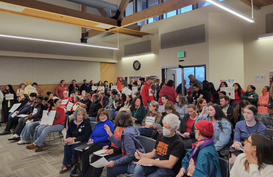 The Springfield School District's board meeting was standing room only Monday night ahead of a budget vote to reduce staffing and cut back dual immersion for older students.