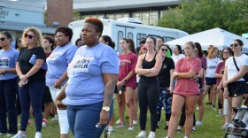 Participants take part in an HIV/AIDS awareness event held by Big Bend Cares in Tallahassee.