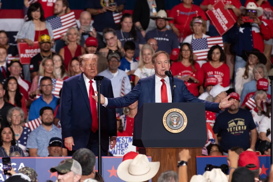 Texas Attorney General Ken Paxton, who is running for U.S. Senate, speaks alongside President Donald Trump at San Antonio’s Freeman Coliseum on Oct. 7, 2026.