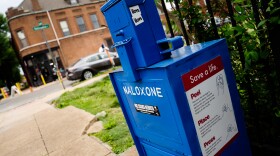 A converted newspaper box holds Naloxone, commonly known as the opioid overdose treatment Narcan, on Friday, May 19, 2023, at Love Bank Park on Cherokee Street. 