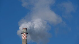 Steam and exhaust rise from the smokestack of a natural-gas powered power plant in Berlin, Germany.