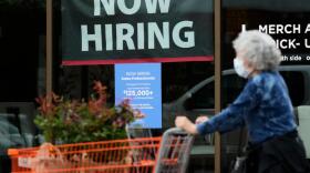 Hiring sign for sales professionals is displayed at a store, in Vernon Hills, Ill., Wednesday, April 15, 2026. (Nam Y. Huh/AP)