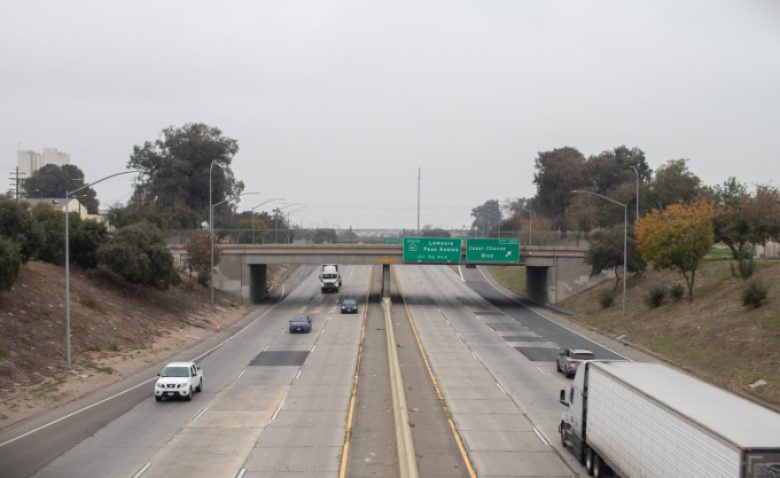 Image of Hwy 99 and its signage from inside a vehicle.