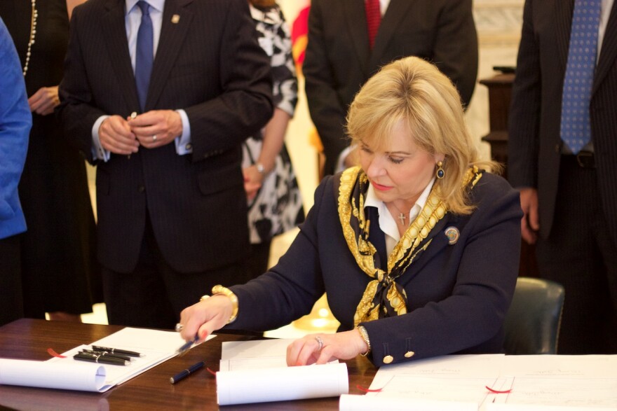 Gov. Mary Fallin signs into law bills part of a criminal justice reform package