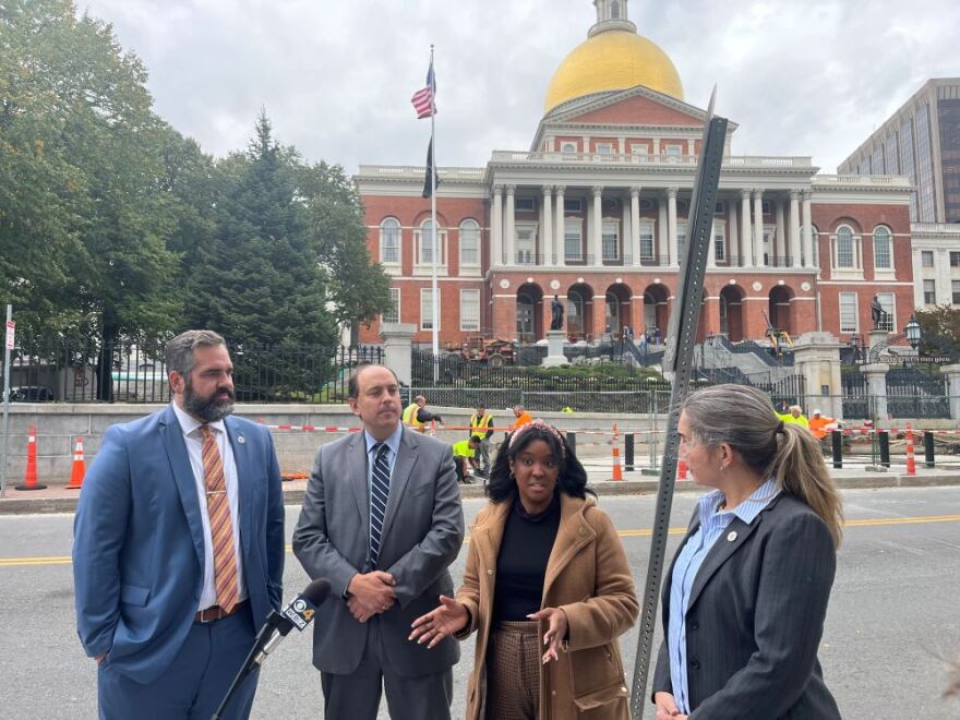  Rep. Mike Connolly, Sen. Jamie Eldridge, Boston City Councilor Kendra Lara, and Rep. Jamie Belsito hold a press conference Thursday, Oct. 13, 2022,  in front of the Statehouse on a bill filed to set a limit on the maximum tax credit that would flow back to high-income earners under Chapter 62F. 