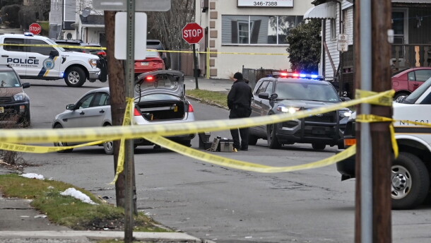 Scranton Police and Pennsylvania State Police investigate a section of Swetland Street where a Scranton Police officer was shot early Thursday morning.