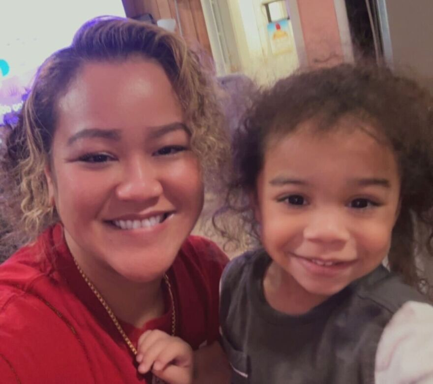 Atcharee Buntow with Dmonhi, her two-year-old son, after her release from ICE custody on Oct. 2, 2025.