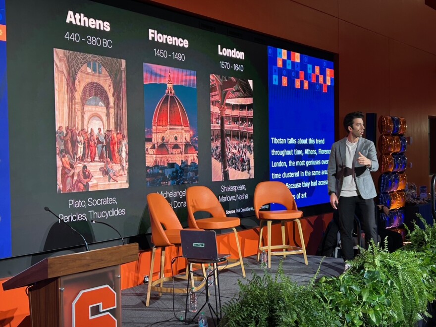 Jon Youshaei speaks during ’CUSE Creator Con at Syracuse University, emphasizing that creators have existed in every era — from writers and artists of the past to today’s digital influencers.