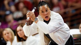South Carolina head coach Dawn Staley directs her team against Southern California during the first half in the second round of the NCAA college basketball tournament, Monday, March 23, 2026, in Columbia, S.C. (AP Photo/Nell Redmond)
