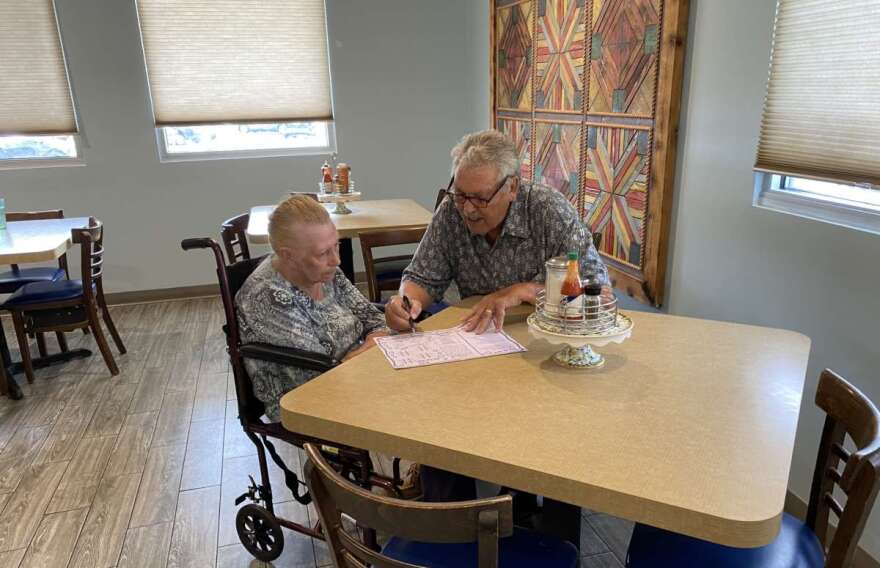 Judy and Roy Scherer enjoy dining at Town House Restaurant in Oviedo, where a controlled environment and trained wait staff accommodate her dementia. Photo: Joe Byrnes, WMFE News