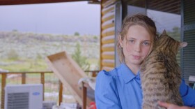 A girl holding a cat