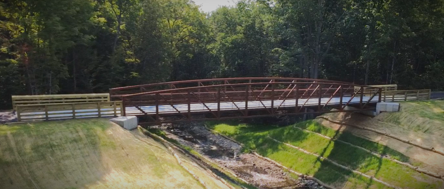 The newly built bridge above Buckhorn Creek in Muskegon. The bridge is part of a $2.2 million project to restore the creek's shoreline and banks and remove a dam that separated it from the Muskegon River.