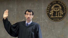 Fulton County Superior Court Judge Robert McBurney swears in potential jurors on May 2, 2022, as he seats a special grand jury to look into the actions of former President Donald Trump and his allies who tried to overturn the 2020 election.