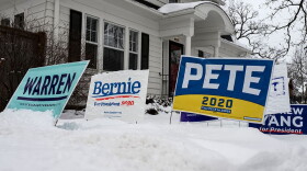Signs for a number of different candidates are staked in the lawn outside of a home in Des Moines, Iowa, on January 25, 2020. - With nine days to go candidates vying for the Democratic presidential nomination are making their final push in Iowa before the caucuses on February 3, 2020. (STEPHEN MATUREN/AFP via Getty Images)