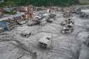 A drone view of the aftermath of flash flooding along the Trishuli River in the Devighat area of Nuwakot district, Nepal, Saturday, Aug. 29, 2026. 