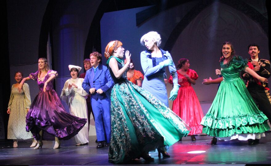 Anna and Elsa bump into each other during coronation ball.