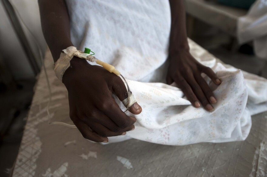 A cholera patient arrives at the Cholera Treatment Center in the Carrefour area of Port-au-Prince, on December 10, 2014. The Caribbean country's cholera outbreak started in 2010 and "an unacceptable number of people have been affected, with nearly 712,330 suspected cases and an estimated 8,655 deaths," the report by the UN's Office for the Coordination of Humanitarian Affairs (OCHA) said.