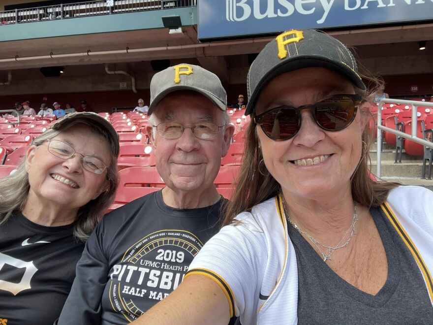 A photo at Busch Stadium of Anita, Pete and Anne Peterson.