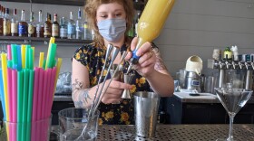 Bartender Hayley Wilson mixes a drink at the Portland Hunt & Alpine Club in Portland, Maine.