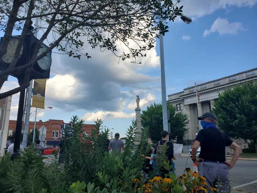 A side view of the Confederate Monument in downtown Graham on July 1, 2020, during a Black Lives Matter protest