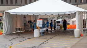 A UC Health drive-thru COVID-19 screening facility opens for patients in the wake of the coronavirus COVID-19 pandemic, Thursday, March 19, 2020, in Cincinnati.