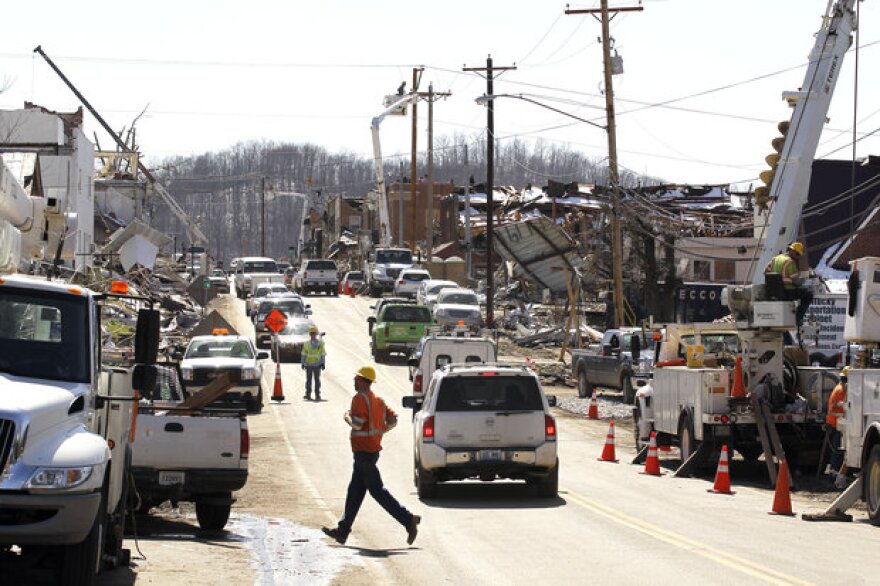 Downtown West Liberty was full of activity Tuesday amid the devastation as repair work continued. Residents and business owners were allowed into the area for the first time since Friday's storm