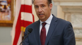 Preston Doerflinger, Oklahoma's secretary of finance, speaks during a news conference in Oklahoma City, Tuesday, Dec. 20, 2016. 